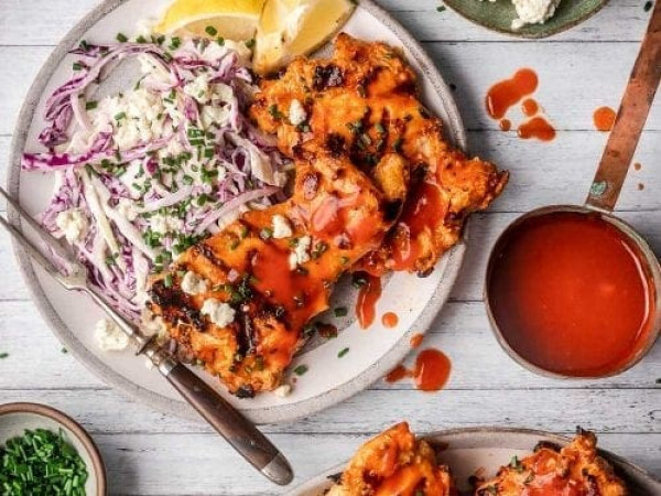 Buffalo Chicken Thighs on the Grill with Blue Cheese Slaw